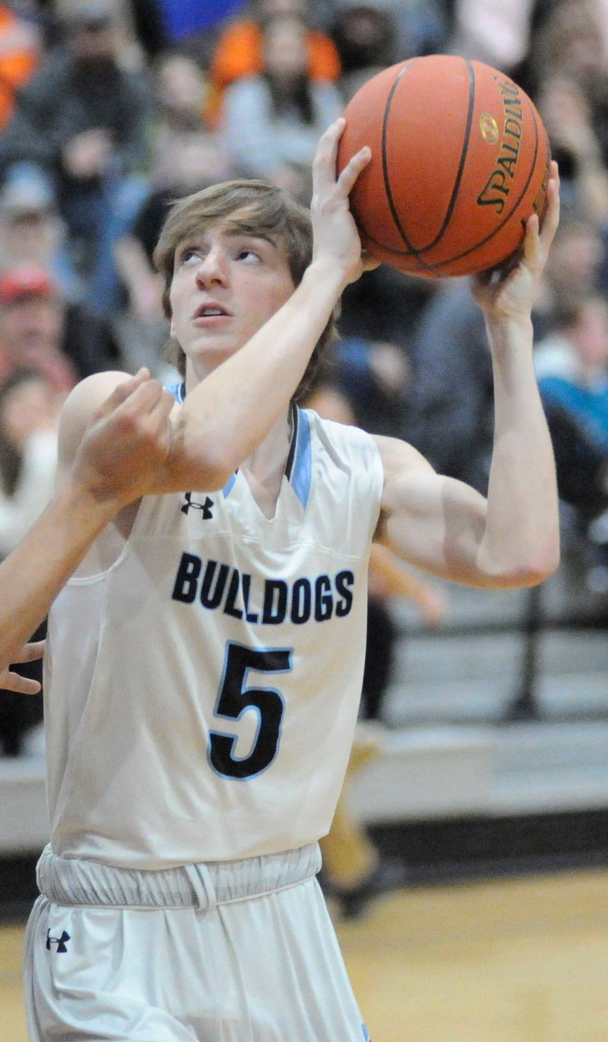 Rising to the occasion. Sullivan West’s Allyn Walter eyes the rim.